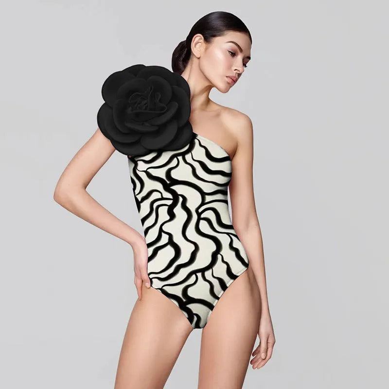 One-piece swimsuit with three-dimensional flower pattern in European and American fit.