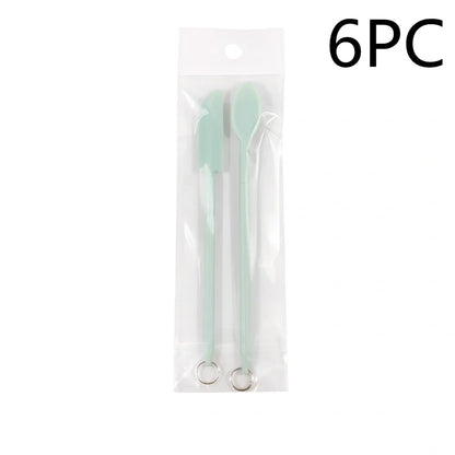 Retractable silicone cosmetic spatula extended to 15cm with scraper tool for product application