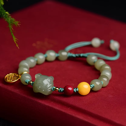 Natural Hetian jade cinnabar beeswax bracelet with animal zodiac modelling and 5x7mm beads