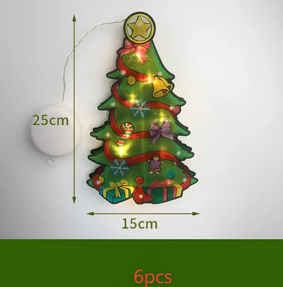LED Christmas hanging lights with suction cups showing snowman design illuminated on window