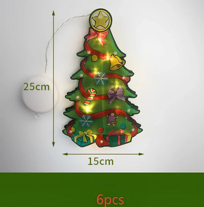 LED Christmas hanging lights with suction cups showing snowman design illuminated on window