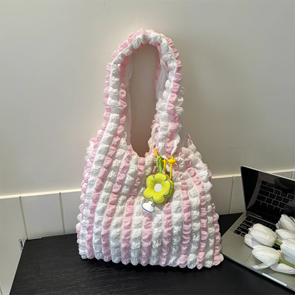Women's pleated bubble crossbody bag in vertical square shape with pendant accessory