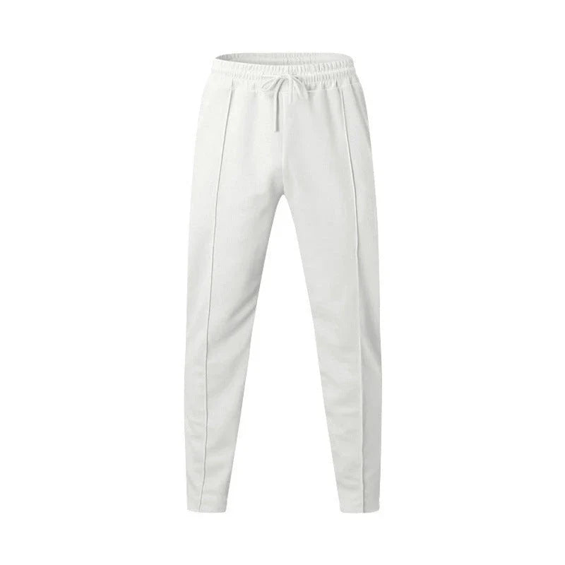 Relaxed fit drawstring waist sports pants for men in various colors and sizes