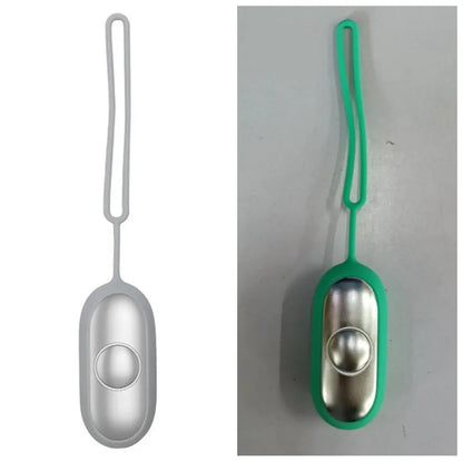 Hand-held micro-current sleep aid device in grey, green, and orange colour options
