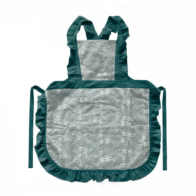 Minimalist kitchen apron with X-strap design in cotton linen fabric showing lace trim detail