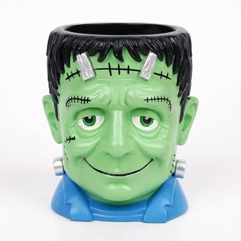 Halloween resin flower pot decorations featuring cartoon bandage zombie, white ghost, Frankenstein, and death designs, hand-painted synthetic resin crafts for spooky seasonal displays, table centrepieces, or party décor
