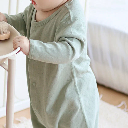 Pure cotton baby romper in blue with long sleeves and single-breasted closure, showing long climbing style design