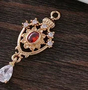 Small copper water drop pendant with zircon detailing in five colour options.