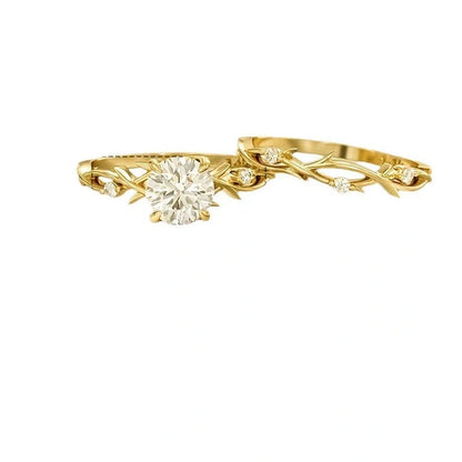 Geometric design rose gold plated couple rings with simulation diamond centrepiece showing faceted edges