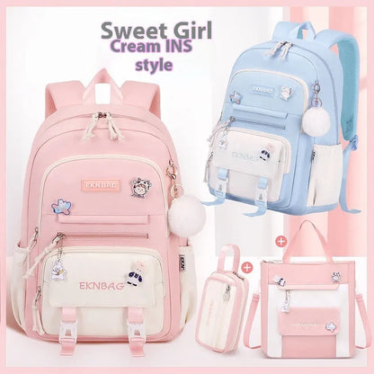 Pink waterproof Oxford cloth school backpack for girls with curved shoulder straps, shown with matching pencil case.