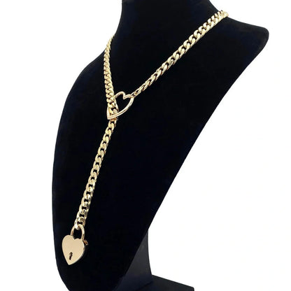 Adjustable heart-shaped O-ring slip chain necklace in black, silver, and gold