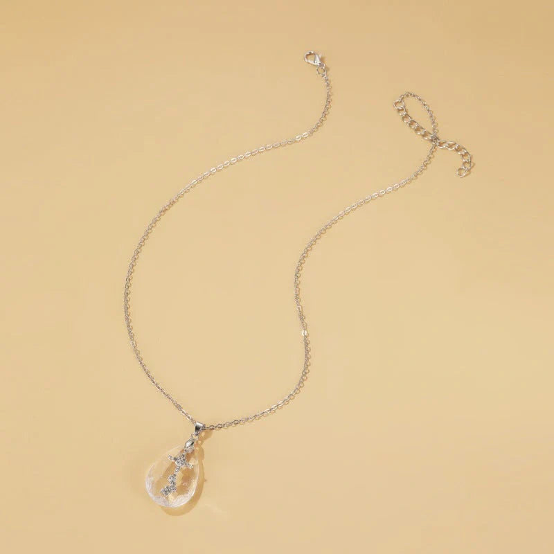 Chic drop pendant necklace made of premium electroplated alloy with a delicate cross-chain design, perfect for elevating any outfit