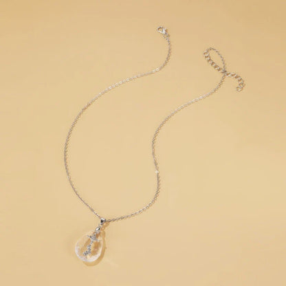 Chic drop pendant necklace made of premium electroplated alloy with a delicate cross-chain design, perfect for elevating any outfit