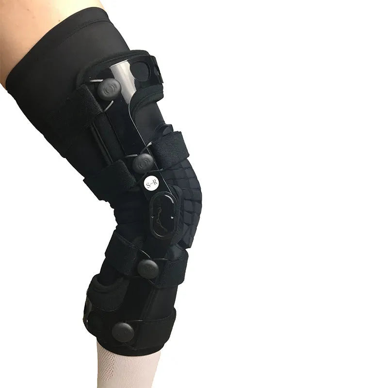 Black anterior ligament knee support brace with dual adjustable straps, shown on a knee.