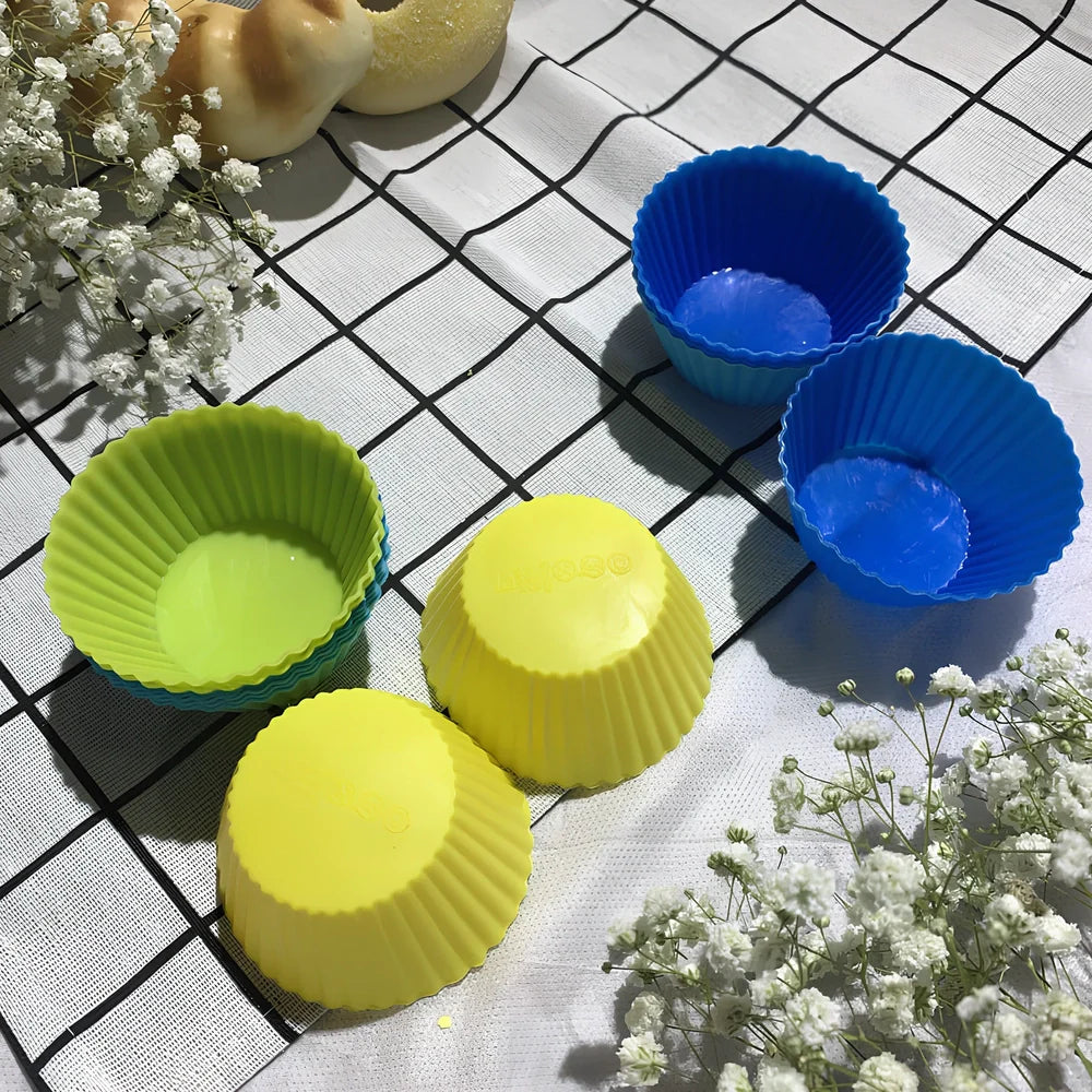 Six different coloured silicone cupcake liners showing fluted edges and nonstick surface