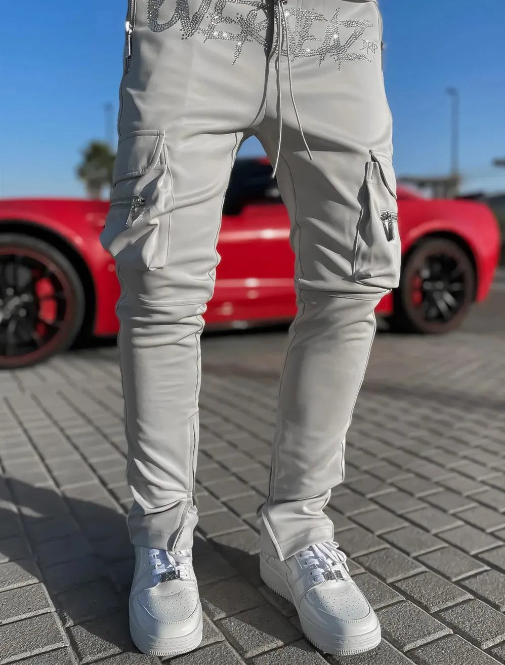 Men's multi-pocket cargo pants in khaki cotton blend with stretch fabric, mid-waist, small feet cuff, athleisure style.