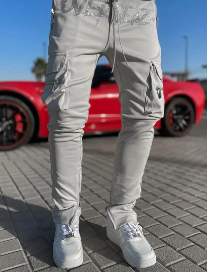 Men's multi-pocket cargo pants in khaki cotton blend with stretch fabric, mid-waist, small feet cuff, athleisure style.