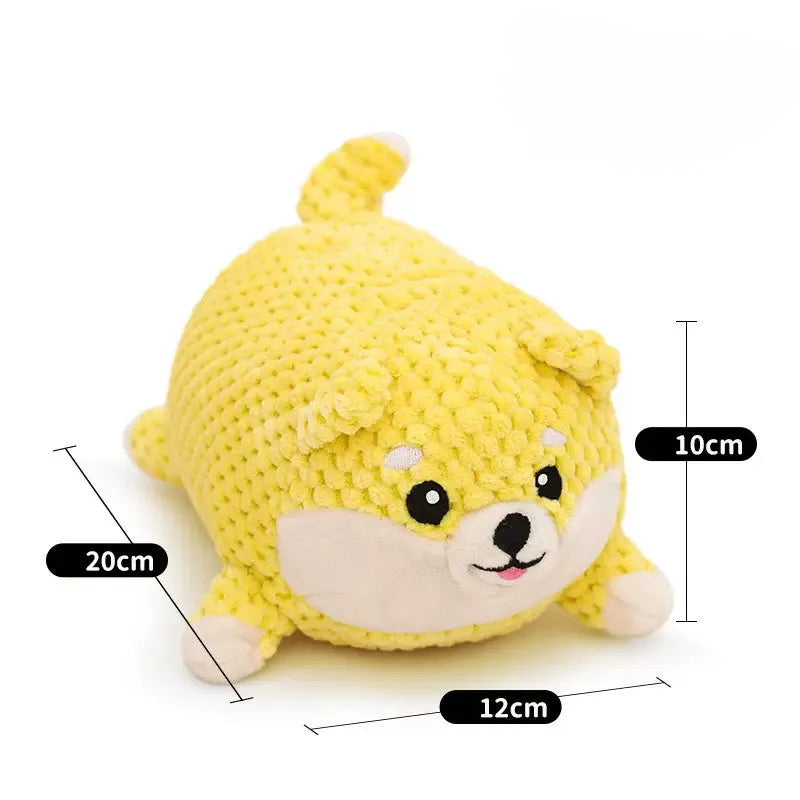 Calming plush dog toy with teeth cleaning chew surface and squeaker