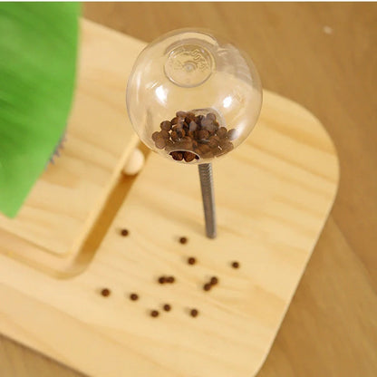 Vertical wooden cat scratching post with chamfered edges and food drop ball attachment