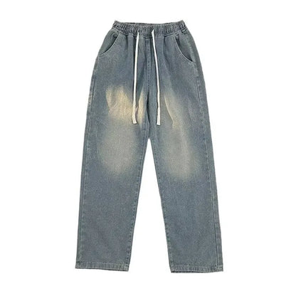 Straight-leg loose fit men's jeans in blue denim with drawstring waist for casual spring summer wear