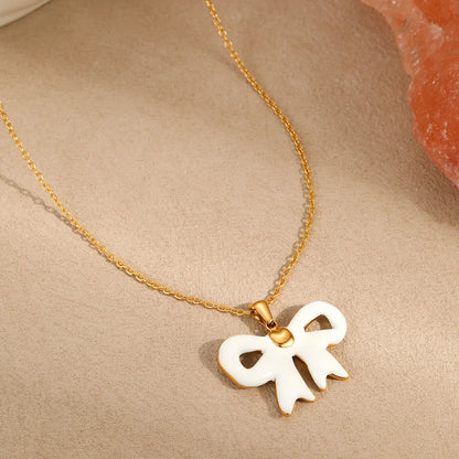 Bowknot necklace and earrings set with adjustable chain in pink and white colour options