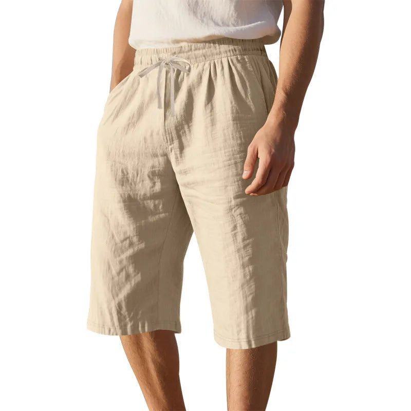 Men's linen shorts in light blue with drawstring waist and cropped straight-leg design