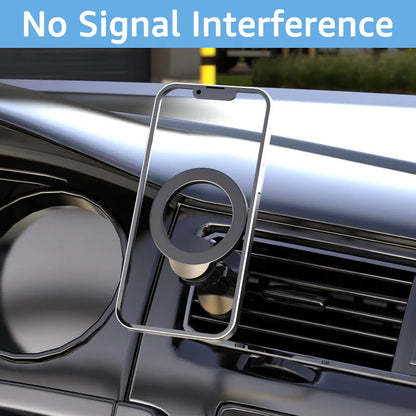 Black magnetic car phone holder clipped onto a car air vent, showing O-ring magnet and silicone grips.