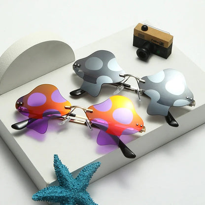 Rimless sunglasses with blue lenses and gold metal frames showing Class 3 protection and adjustable ports