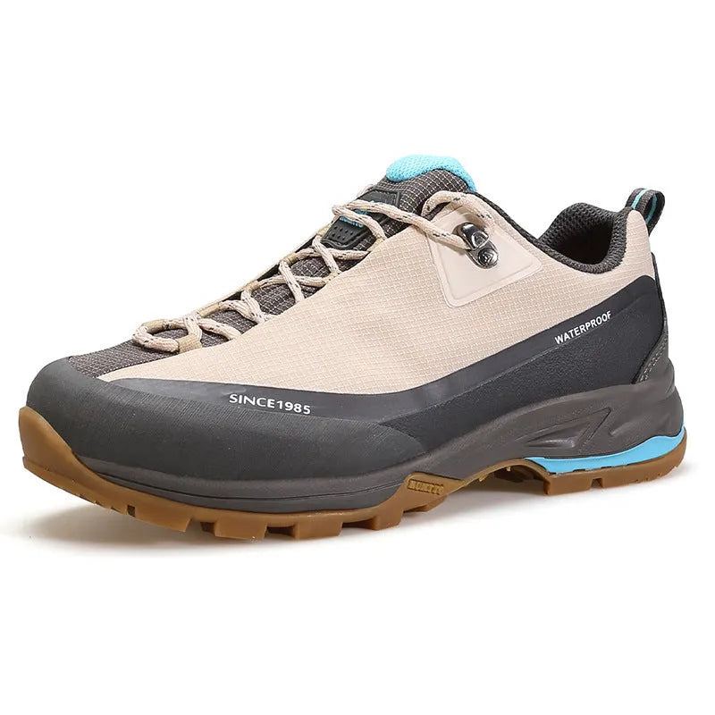 Men's low-top hiking boots in black with lace-up front and rubber outsole.