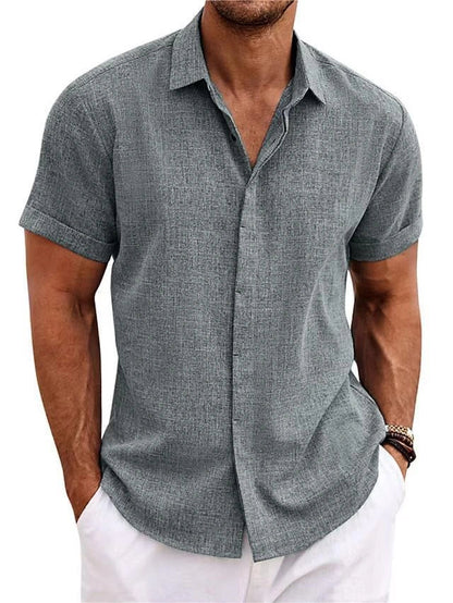 A versatile linen shirt in various colors, featuring a standing collar and short sleeves for a modern, tailored look.