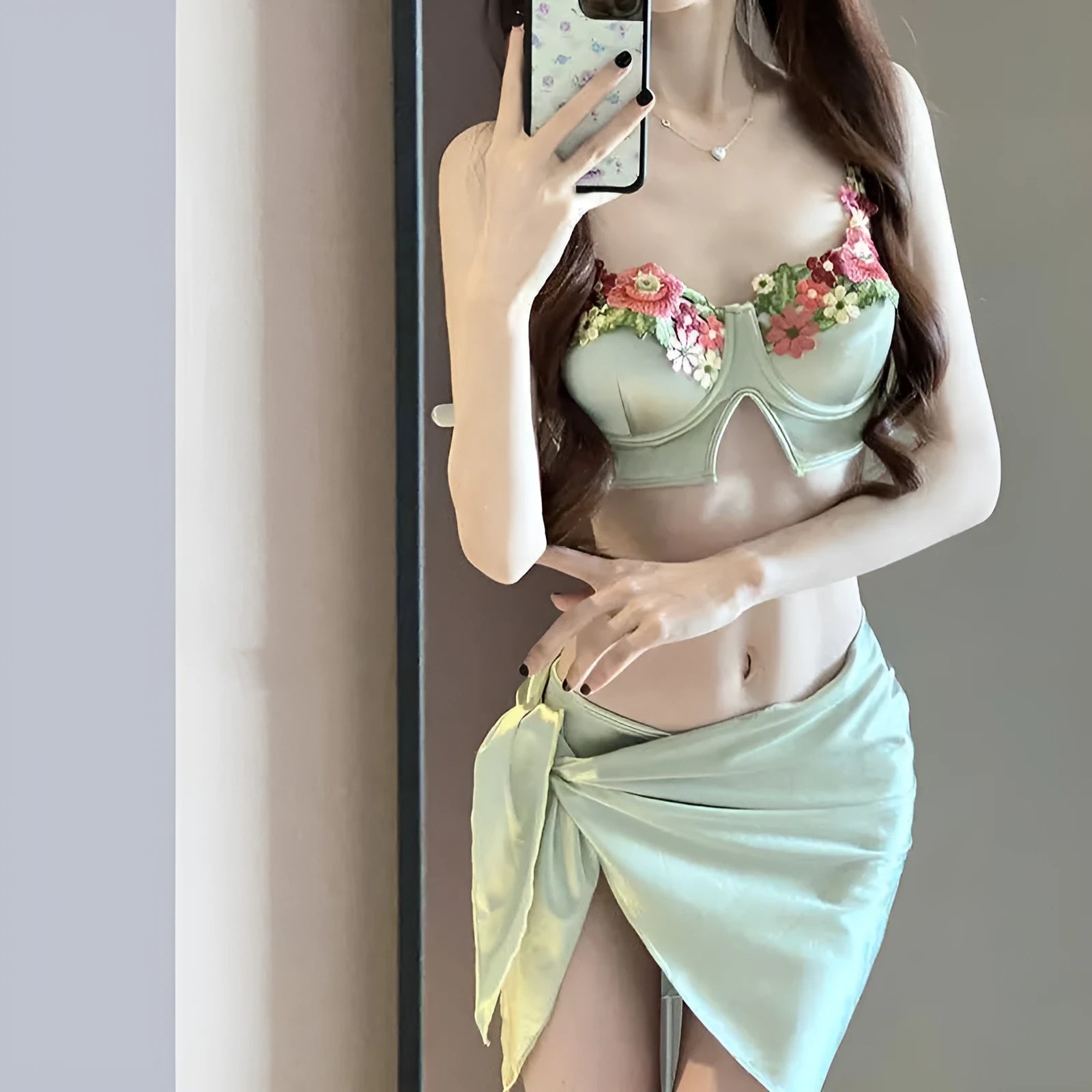 Green women's bikini three-piece swimsuit set with triangle top and briefs