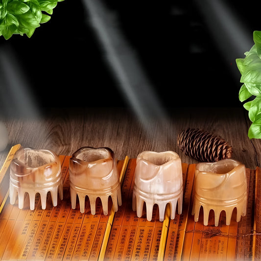 Black half-moon shaped buffalo horn comb with wide teeth for scalp massage and detangling hair.