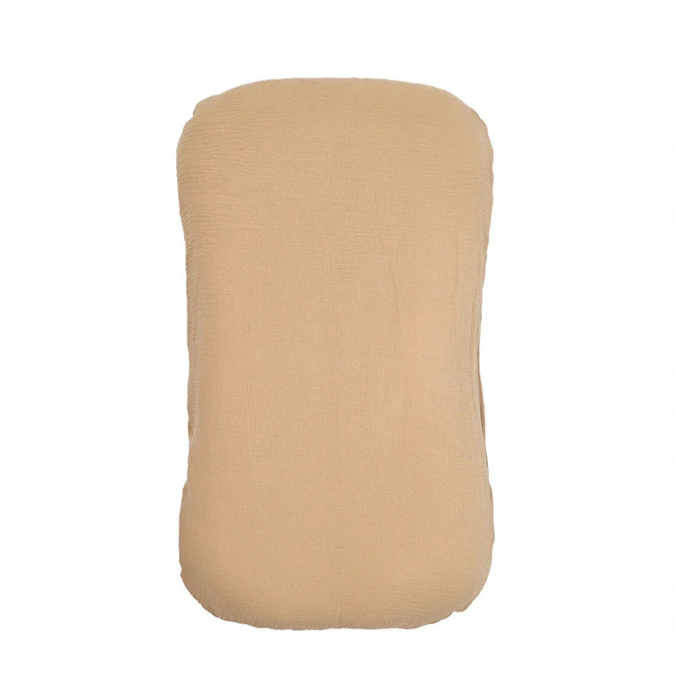 Portable crib with interchangeable fabric cover showing 75x45cm dimensions and multiple colour options