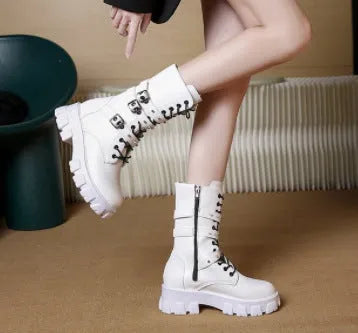 Women's black mid-calf knight boots with side zipper and metal buckle details