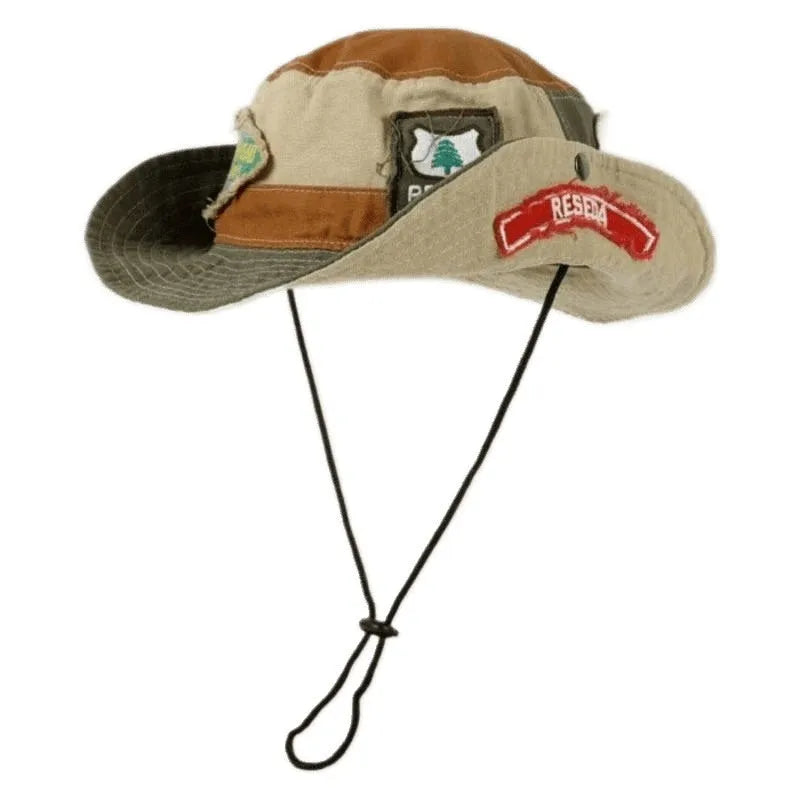 Army green cotton foldable fisherman hat with flat top crown and hand-painted patchwork design