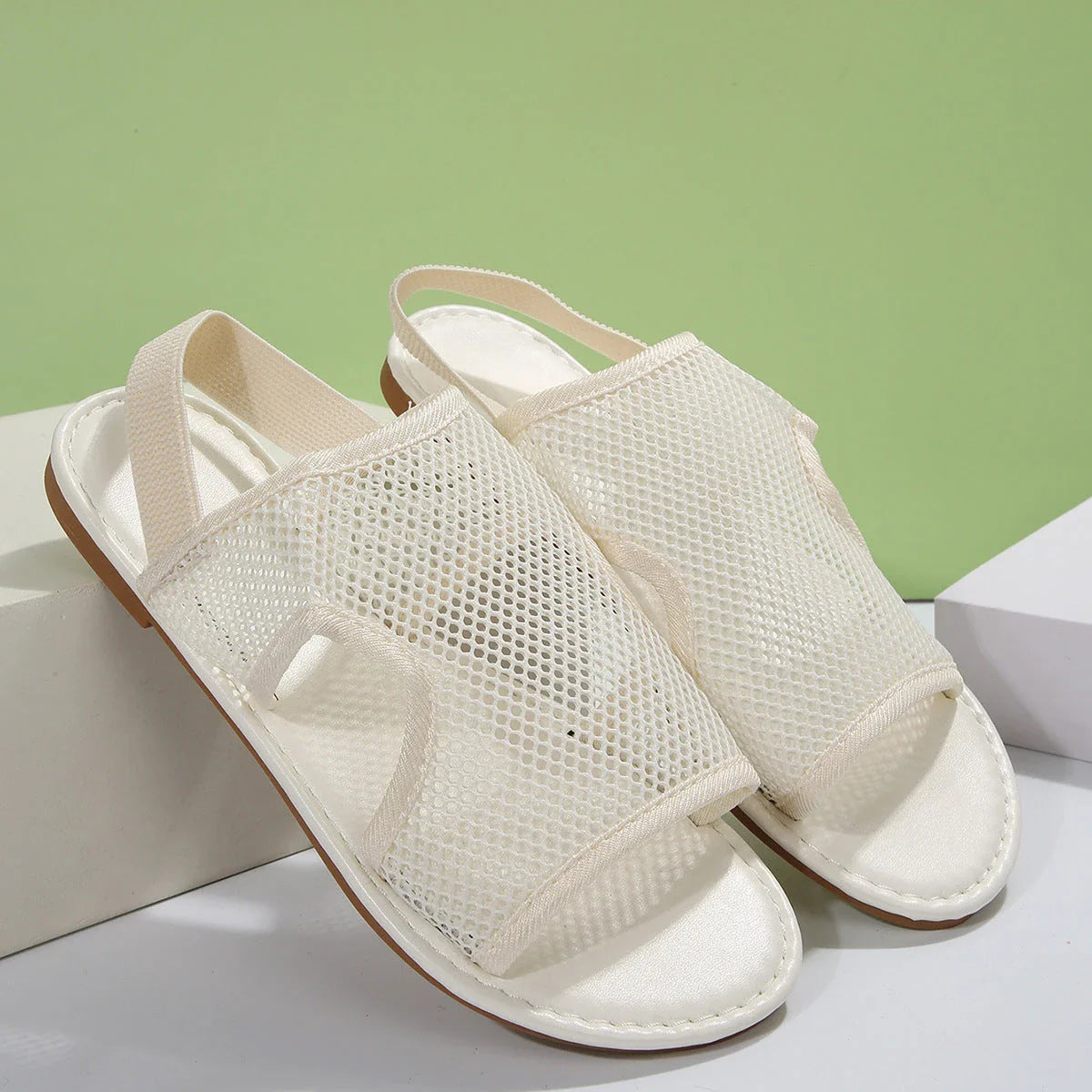 Breathable mesh sandals in various colors and sizes for men and women