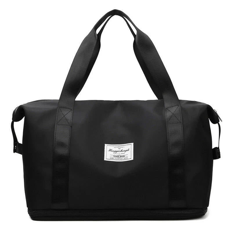 Spacious fitness travel bag with various pockets and compartments for organizing gym, yoga, and outdoor gear