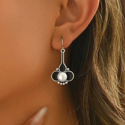 Silver retro fashion earrings with electroplated finish on alloy base, measuring 2.5 cm length