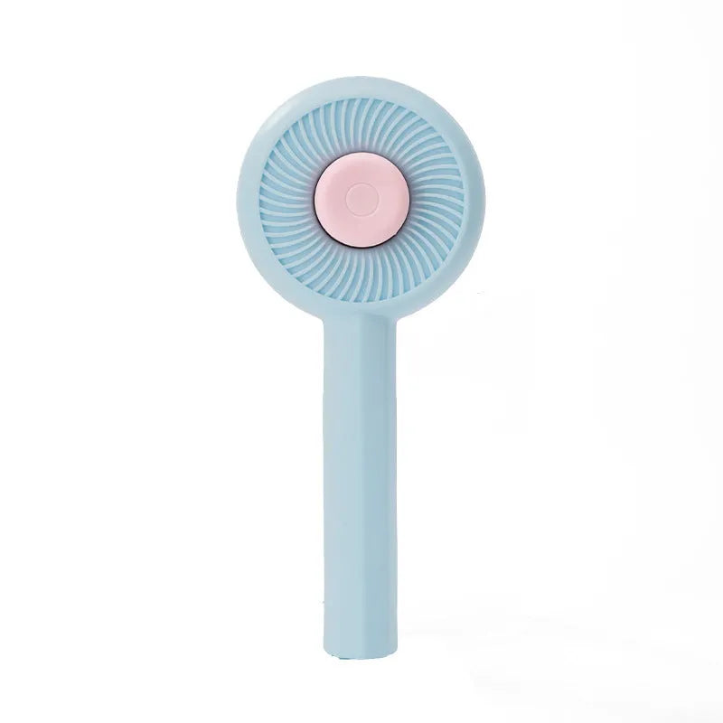 Blue and yellow self-cleaning pet grooming brush with angled metal needles and a push-button on the handle.