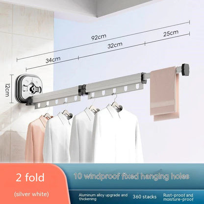Aluminum retractable drying rack mounted on a window, extending outward for clothes drying
