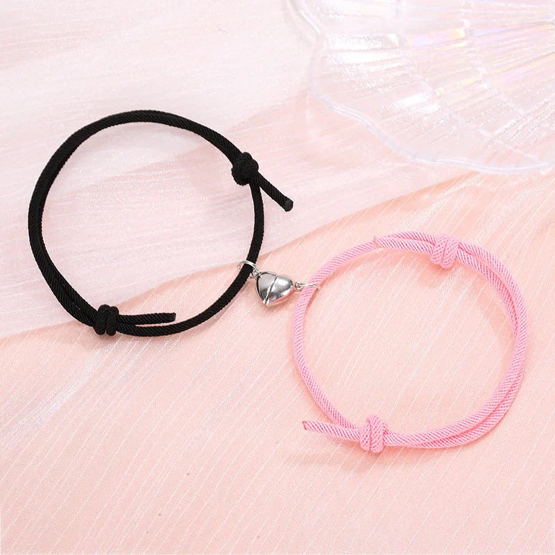 Fashionable magnetic couple bracelets with heart-shaped charms in various color options