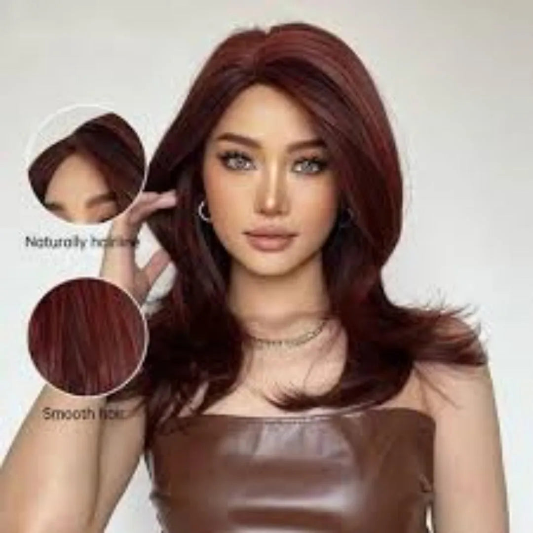 Mid-length curly synthetic wig with long bangs in a platinum gradient colour, shown on a wig stand.