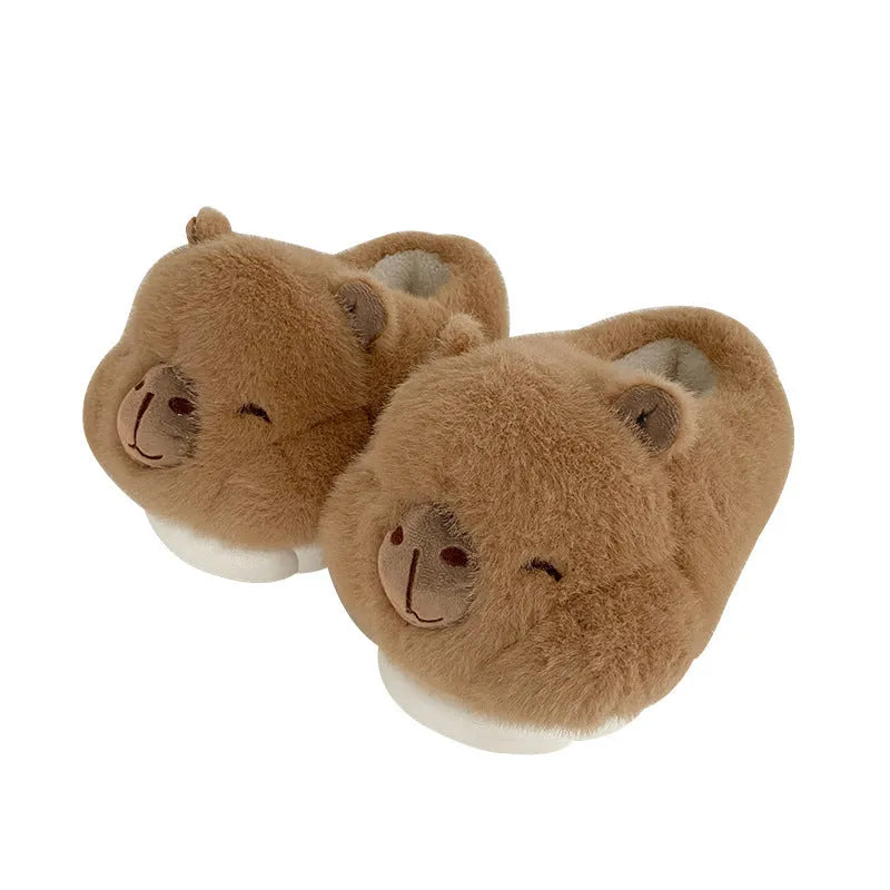 Light brown women's winter slippers with cartoon pattern, plush upper, and thick PVC sole