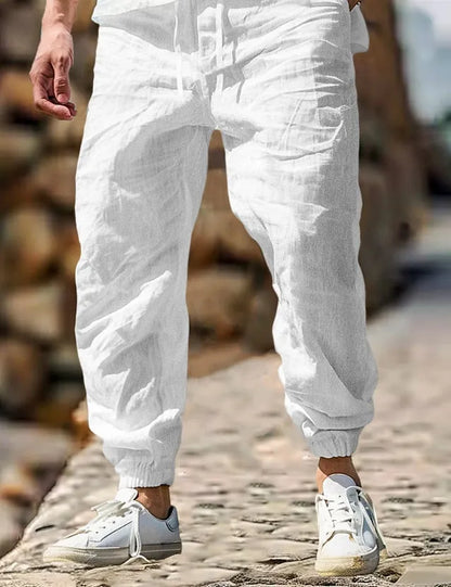 Men's straight-leg cotton trousers with elastic waist in Army Green colour, showing classic fit and summer-appropriate fabric.