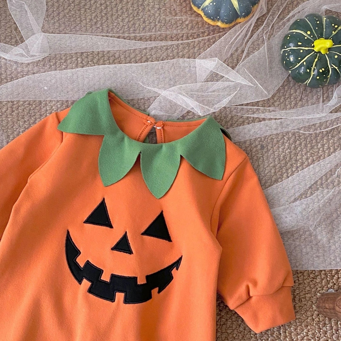 Cotton corduroy baby jumpsuit with long sleeves and pullover closure in European-American style