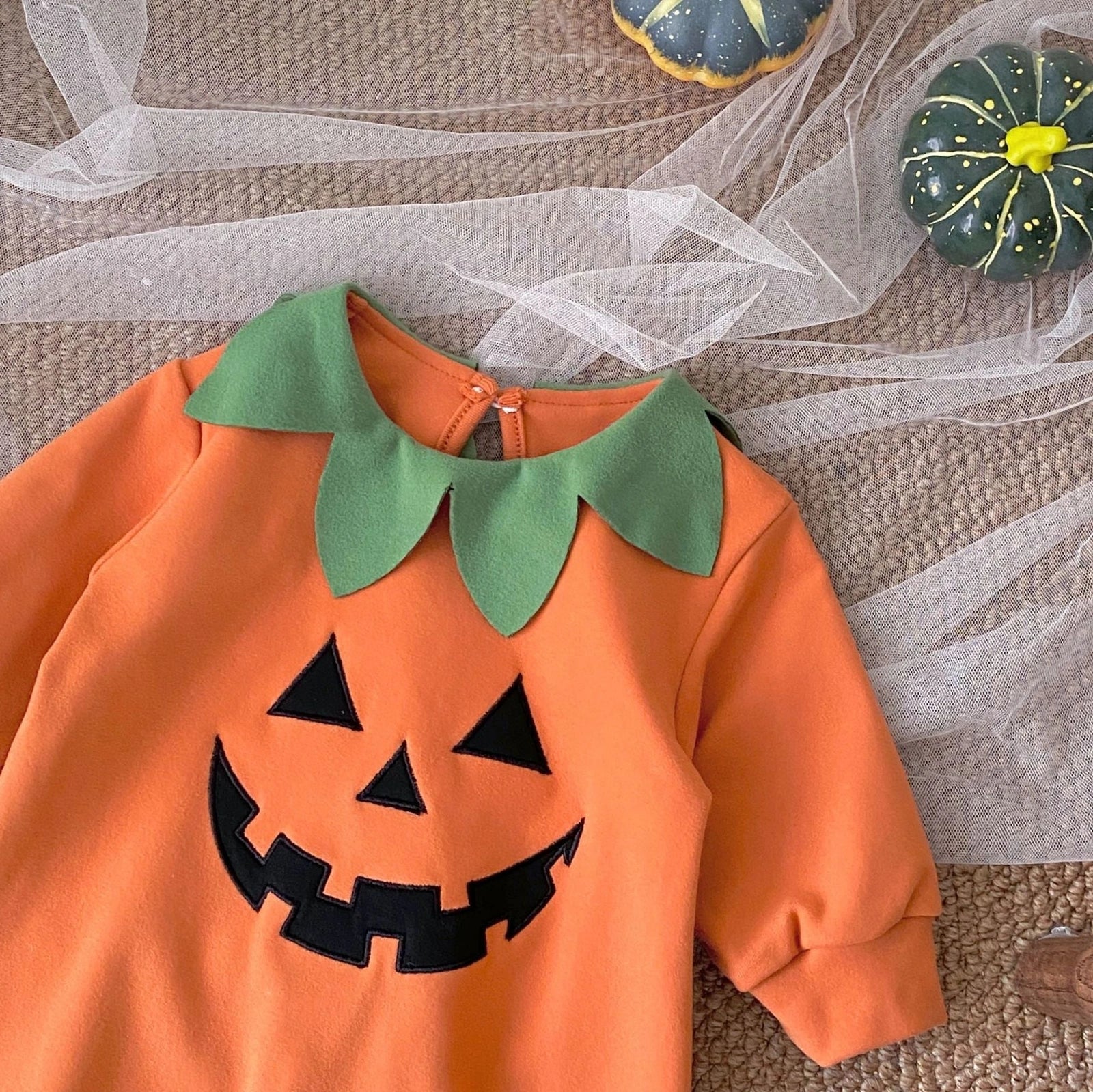 Cotton corduroy baby jumpsuit with long sleeves and pullover closure in European-American style