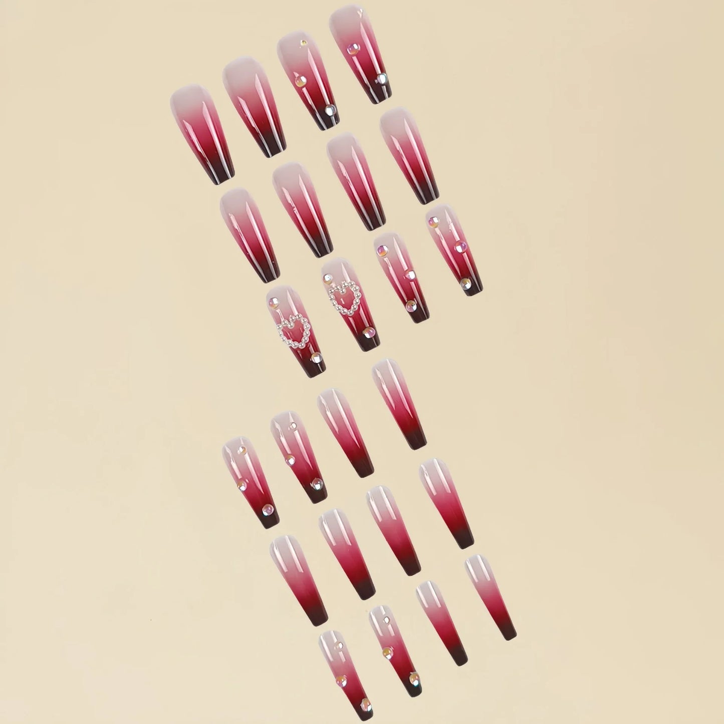 Set of long ballet-style fake nail tips with wine red gradient, white plaid pattern, and pearl heart decorations