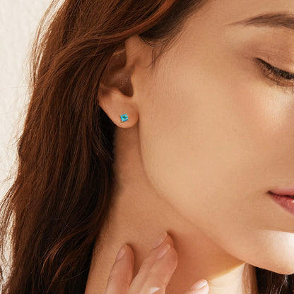 Gold-plated drop earrings with pear-shaped cubic zirconia stones measuring 0.8cm on 3.2cm copper posts
