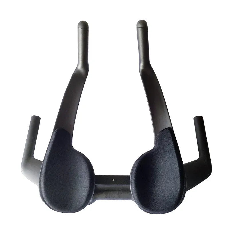 New Field carbon fibre TT bicycle handlebar in black, showing aerodynamic shape and 31.8mm clamp area.