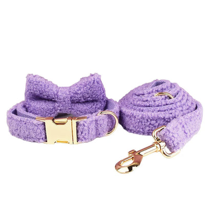 Cloth dog accessory set showing collar, leash, bow, and vest in coordinating fabric